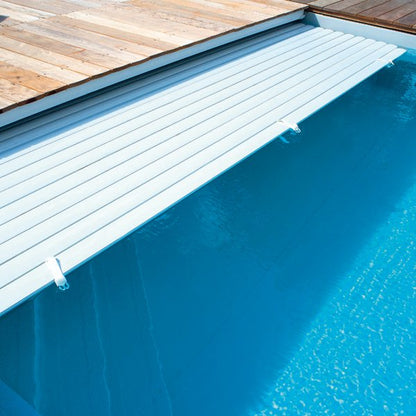Volet roulant piscine immergé